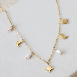 Celestial Pearl Charm Choker – 22K Gold Plated – Crescent Moon & Star Necklace(Celestial Pearl Charm Choker 22k Gold Plated Crescent Moon Star Necklace) 5 Celestial Pearl Charm Choker – 22K Gold Plated – Crescent Moon & Star Necklace(Celestial Pearl Charm Choker 22k Gold Plated Crescent Moon Star Necklace) -Djuna Jewelry Store choker charm