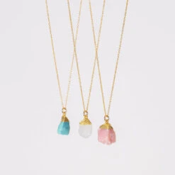 Raw Rainbow Moonstone Necklace With Gold Dipped Pendant(Raw Moonstone Necklace With Gold Dipped Pendant) -Djuna Jewelry Store raw necklace feature 1 12cf64bf dcb3 4517 9fbb 912e7b030b59